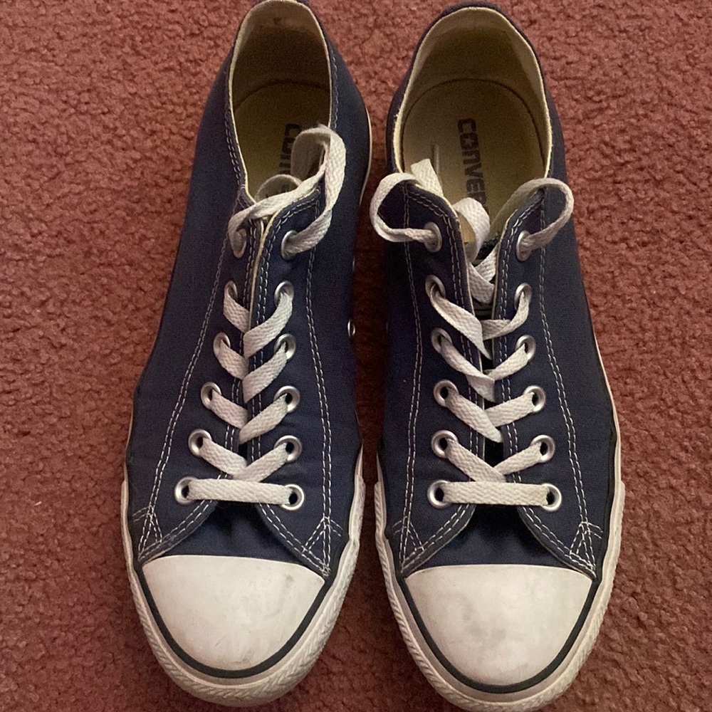 Blue low-top Converse. Used but in very good condition.
